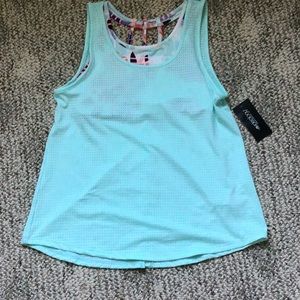 A teal tank top with a built in sports bra.